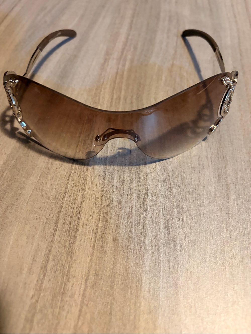 Brown Rimless Women's Sunglasses with Decorative Temples